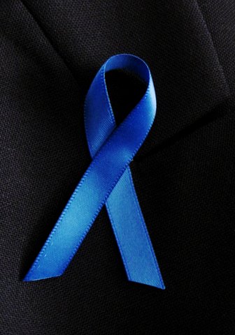 blue ribbon on lapel